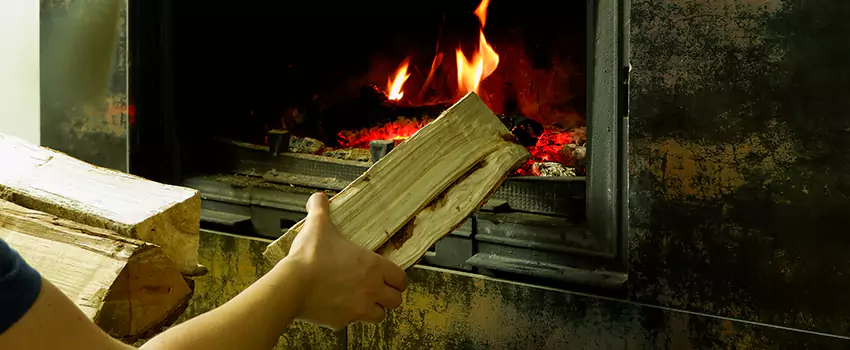 Wood Stove Heat Resistant Wall Repair in Cochrane, Alberta